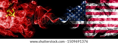 Communist vs United States of America, American abstract smoky mystic flags placed side by side. Thick colored silky smoke flags of Communism and United States of America, American