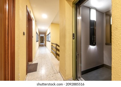 Community Hallway In The Staircase Of An Apartment Building At The Exit Of The Elevator