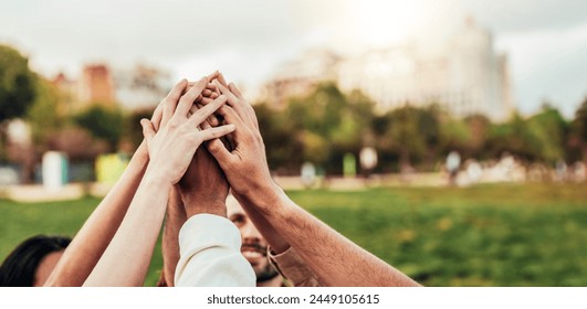 Community of millennial people stacking hands together - Multiracial college students putting their hands on top of each other - Human relationship, social, community and team building concept - Powered by Shutterstock