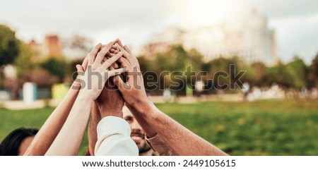 Community of millennial people stacking hands together - Multiracial college students putting their hands on top of each other - Human relationship, social, community and team building concept