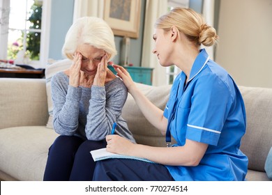 Community Nurse Visits Senior Woman Suffering With Depression