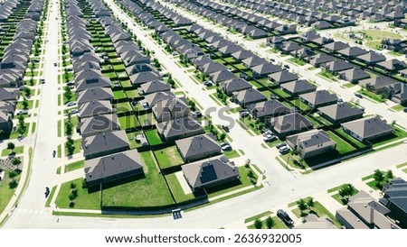 Community playground in master planned development area, fast growing urban expansion Dallas Fort Worth metroplex in Princeton, Texas, new construction homes with young trees immature landscaping. USA
