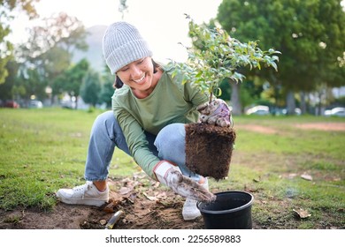 Community service, volunteering and woman plant trees in park, garden and nature for sustainability. Climate change, soil gardening and care for earth day, environmental support and green ecology - Powered by Shutterstock