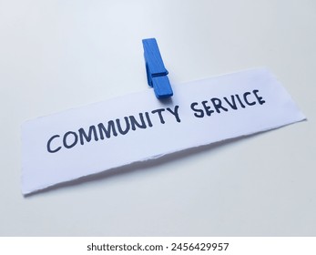 Community service writting on white background. - Powered by Shutterstock