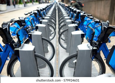 Commute blue city bikes parked outside the street in New York