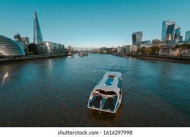 Commuter Bus Boat In Thames River Towards The City Of London