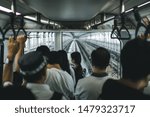 Commuters Riding a Train to Work
