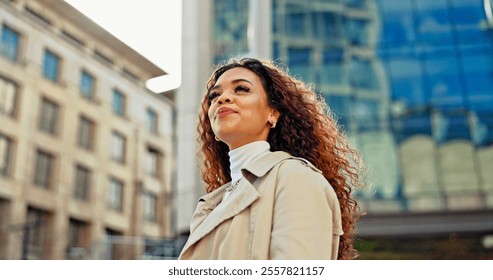 Commuting, thinking and woman in city, travel and journey for work, low angle and outdoor in morning. Trip, contemplating and professional with ideas for journalism, road and opportunity for person - Powered by Shutterstock