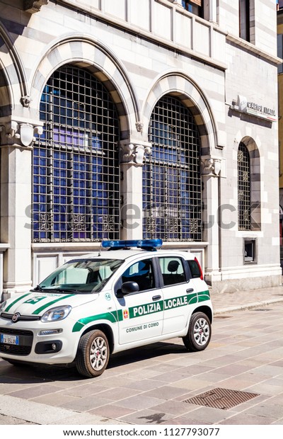 COMO, ITALY\
- JUNE 27,2018:Italian Police  Cars with Big Writing Local POLIZIA\
Parked in Front of the Police Office\
