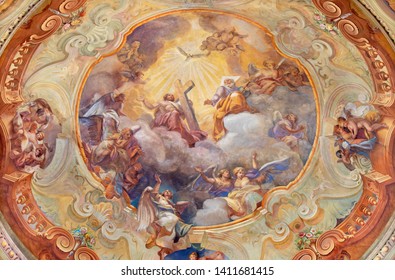 COMO, ITALY - MAY 8, 2015: The ceiling fresco Glory of Holy Trinity in church Santuario del Santissimo Crocifisso by Gersam Turri (1927-1929).  