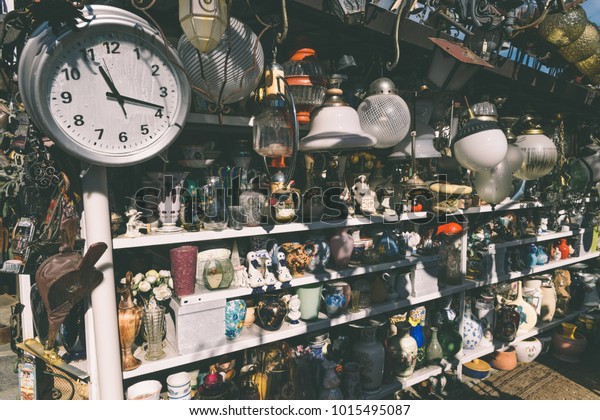 Como, Italy - September 30th, 2017:\
Antiques for sale to bargain hunters in a shop in\
Italy