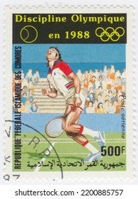 COMORO ISLANDS - 1987 January 28: An 500 Franc Multicolored Postage Stamp Showing Tennis At The 1988 Summer Olympics