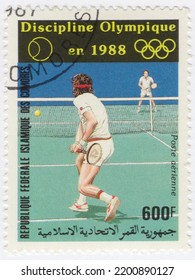 COMORO ISLANDS - 1987 January 28: An 600 Franc Multicolored Postage Stamp Showing Tennis At The 1988 Summer Olympics