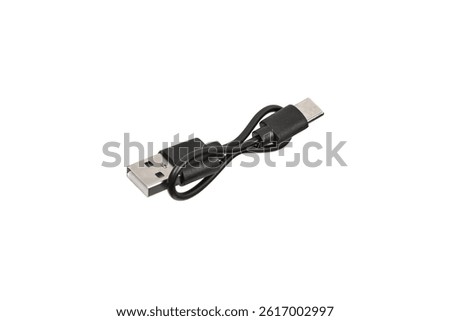 Compact black USB-A to USB-C cable designed for charging or syncing small electronics, ideal for travel or portable use