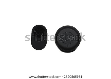 Compact black wireless microphone transmitter with a USB-C charging port and side control button, isolated on a white background.