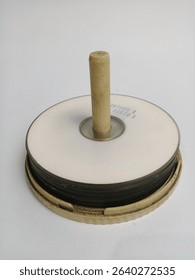 A Compact disc is a digital optical disc storage format, originaly developed for storing and playing audio recordings. It later became widely used for storing CD-ROM, CD-R, CD-RW