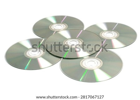 Compact Discs and DVDs Isolated on White Background for Data Storage and Media Concept