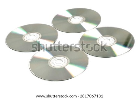 Compact Discs and DVDs Isolated on White Background for Data Storage and Media Concept