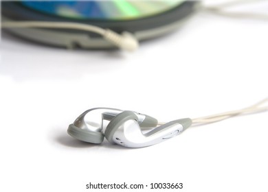 Compact discs and round  blue cd player