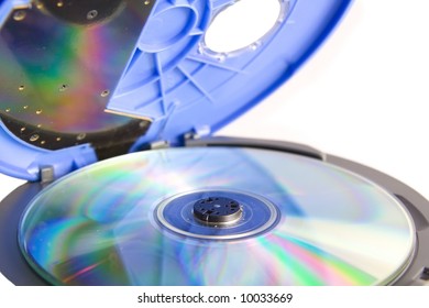 Compact discs and round  blue cd player