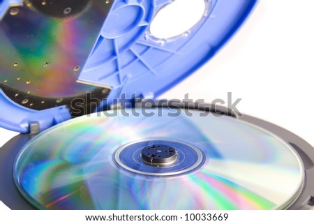 Compact discs and round  blue cd player