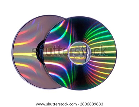 Compact discs show colorful spectrum on their surfaces, representing data and digital media