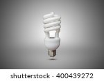 Compact Fluorescent bulb in gray background