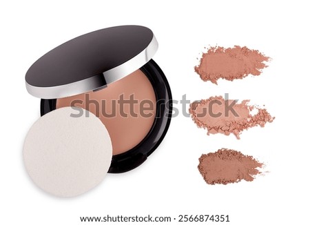 Compact make up foundation for face with foundation sample stroke, isolated on white                               
