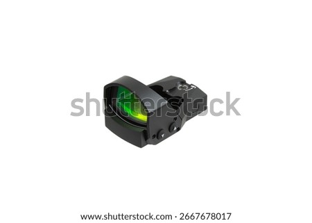 A compact red dot sight for a firearm on a white background.