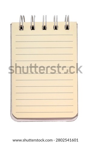 Compact spiral notebook featuring blank ruled paper for organized writing tasks