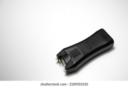 Compact Stun Gun In Black On White Isolate.A Device For Self-defense.