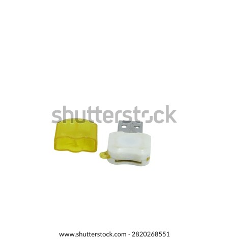 Compact white USB memory card reader with translucent yellow protective cap for data transfer