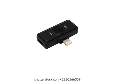Compact wireless microphone receiver with a Lightning connector for smartphone audio and video recording, isolated on a white background.