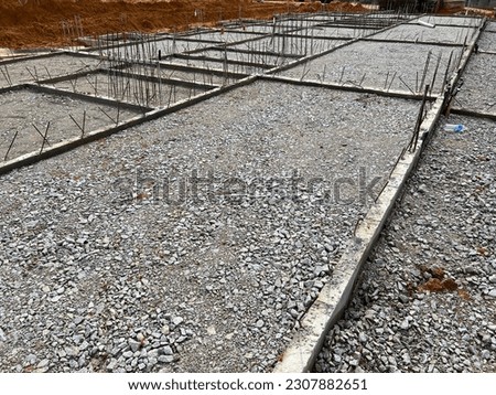 Compacted crusher run before lay of   reinforcement bar for ground slab construction.