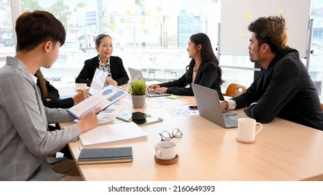 Company Business Meeting Image, A Group Of Asian Businesspeople Having A Formal Meeting In The Conference Room.
