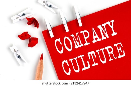 COMPANY CULTURE text on the red paper with office tools on white background