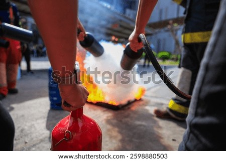 Company employees are undergoing basic fire extinguishing training, fire extinguisher use, safety week, fire prevention, loss prevention,
