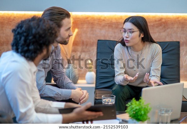 Company
manager holding talks with her
counterparts