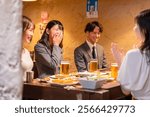 Company woman laughing hysterically and having a good time at a drinking party