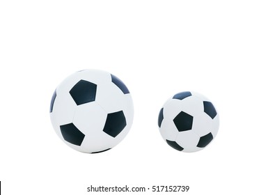 Comparative Big And Small Football. Comparison Concept. Isolated On White Background.