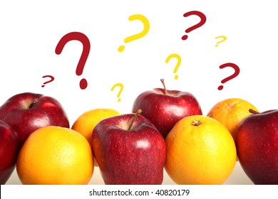 Compare Apples And Orange - Isolated On A White Background