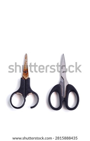 Comparison of a clean pair of scissors and a rusty damaged pair isolated on a white background, showing wear, corrosion, deterioration, and replacement concept.