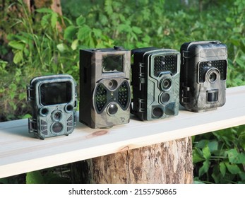 Comparison Of Different Trail Camera. Photo And Video Trap. Animal And Surroundings Monitoring Device With Motion Sensor And Night Vision