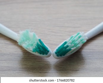 Comparison Of The Old And New Toothbrushes Showing Different Bristle Conditions: Time To Change A New Toothbrush