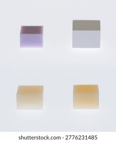 Comparison of raw e.max and zirconia vs sintered e.max and zirconia. Size differences in dental materials before and after sintering