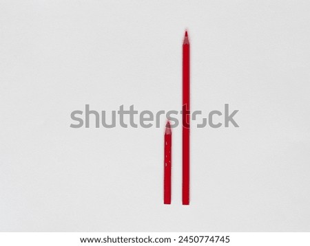 Comparison of two red pencils