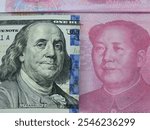 Comparison of US and Chinese currency featuring Benjamin Franklin and Mao Zedong on paper notes