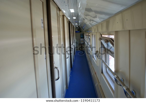 A compartment car in a\
train.