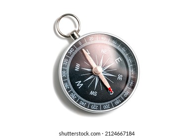 Compass with a black dial isolate on a white background. Traditional navigation device indicating the cardinal points (north, south, east, and west). - Shutterstock ID 2124667184