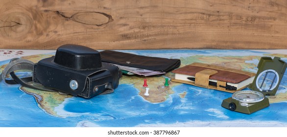 compass, camera, notebook